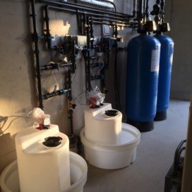 Cooling Tower System With Anti-Scaling Dosing and Bioside Dosing with an inline brominator, softener and monitoring equipment.